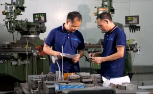 hardware-engineers-inspecting-precision-tooling-molds