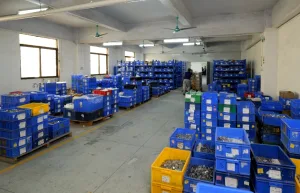 Large inventory of industrial hardware components stored in factory warehouse