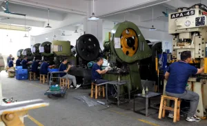 Metal stamping mass production line with multiple punch press machines