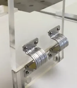HSP custom torque hinges mounted on a demonstration test fixture for OEM equipment