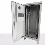 Industrial concealed hinge installed on an open electrical enclosure door with gasket and internal mounting frame