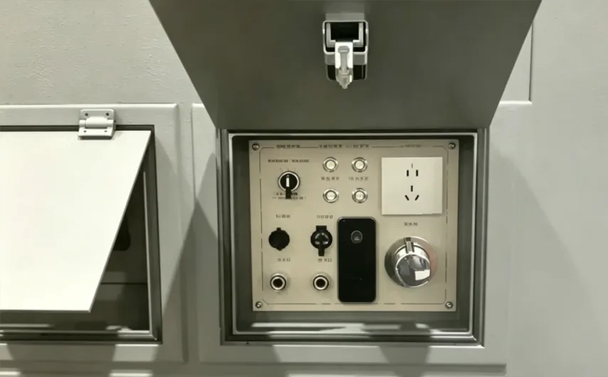 Constant torque hinge holding a recessed control-panel hatch open at any angle, shown open and closed